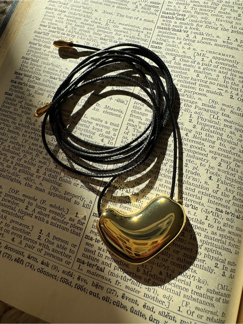 Gold Heart Pendant Necklace on Black Cord